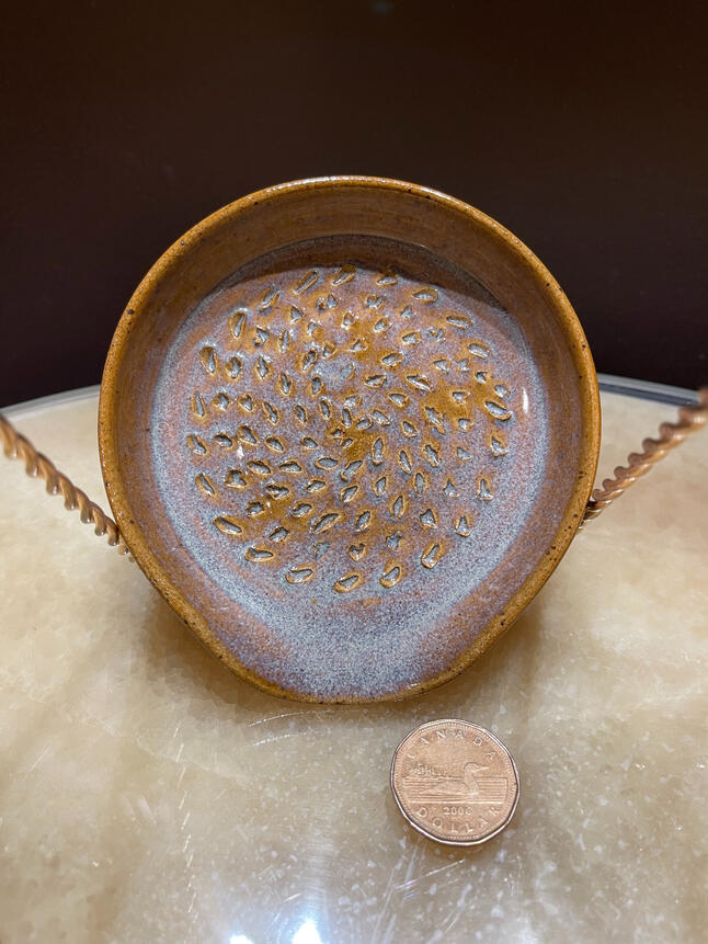 $25 (garlic grater)